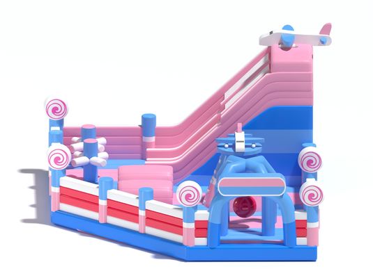 Trẻ em bơm lên nhỏ bơm lên lâu đài màu hồng màu xanh với slide