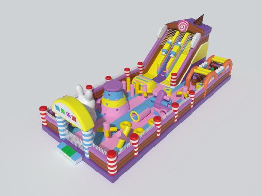 Ngôi lâu đài bơm có chủ đề kẹo với slide lớn